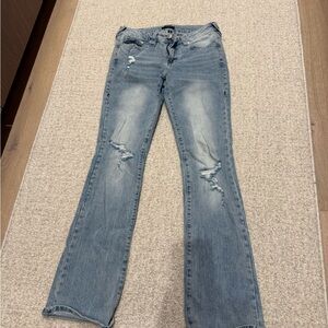 BECCA Light Blue Distressed Flare Jeans